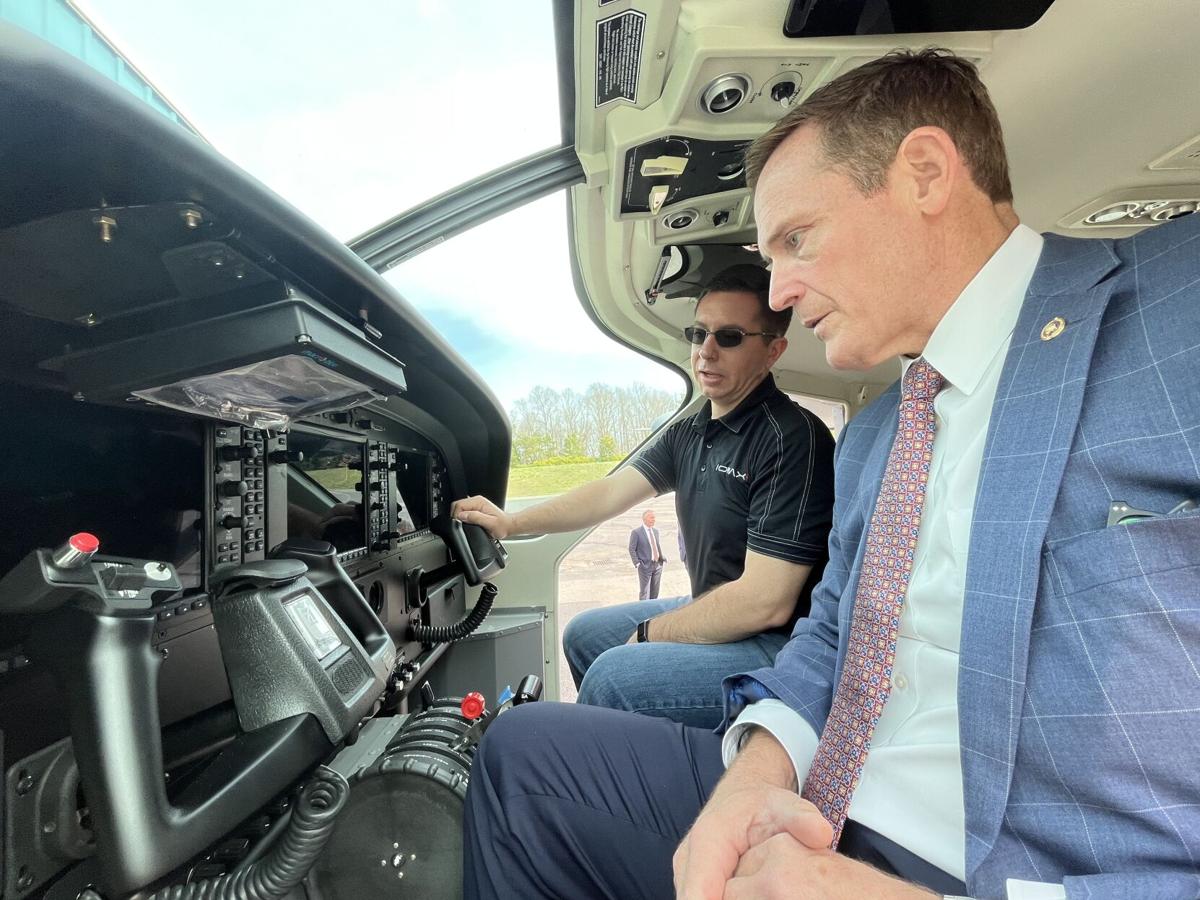 Alan Wilkes shows off the cockpit of a Textron Cessna Caravan
